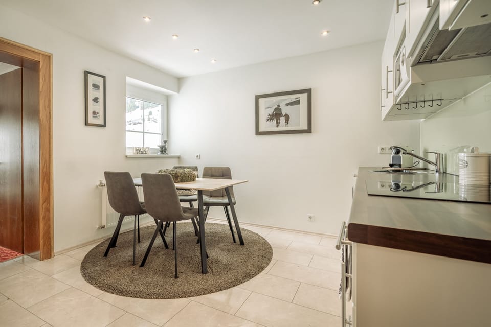 Classic Apartment | Living area | 80-cm flat-screen TV with satellite channels, TV