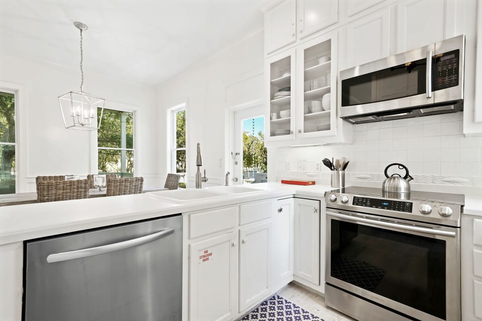 UPDATED STAINLESS STEEL APPLIANCES THROUGHOUT KITCHEN