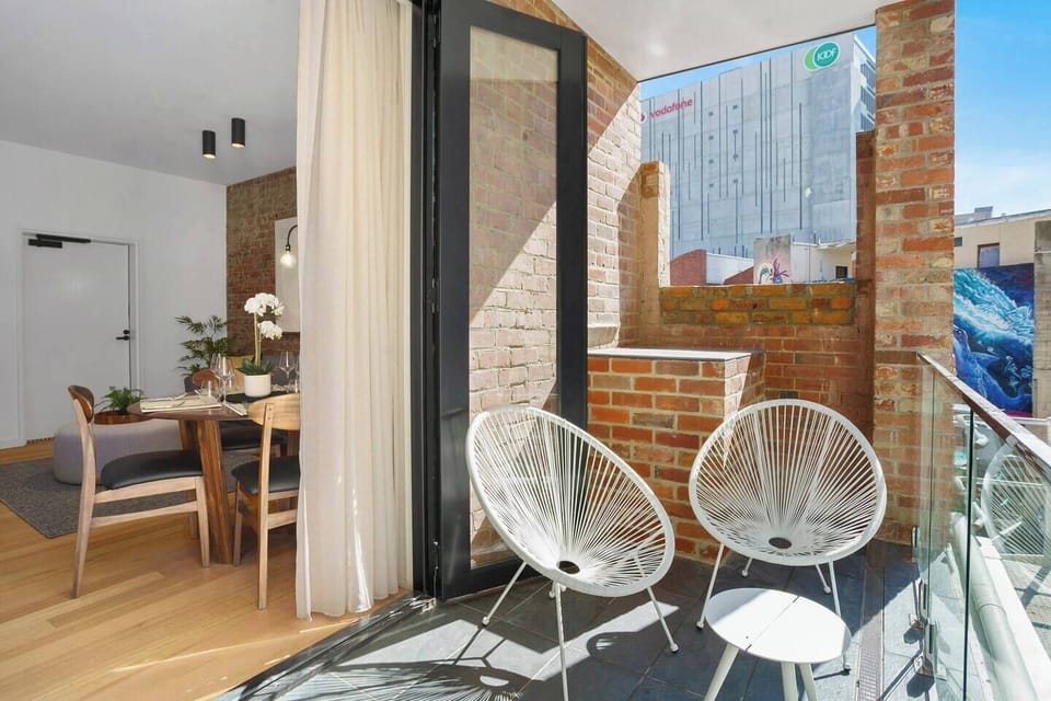 Get your dose of morning sunshine with a cup of coffee on the private balcony off the living area.