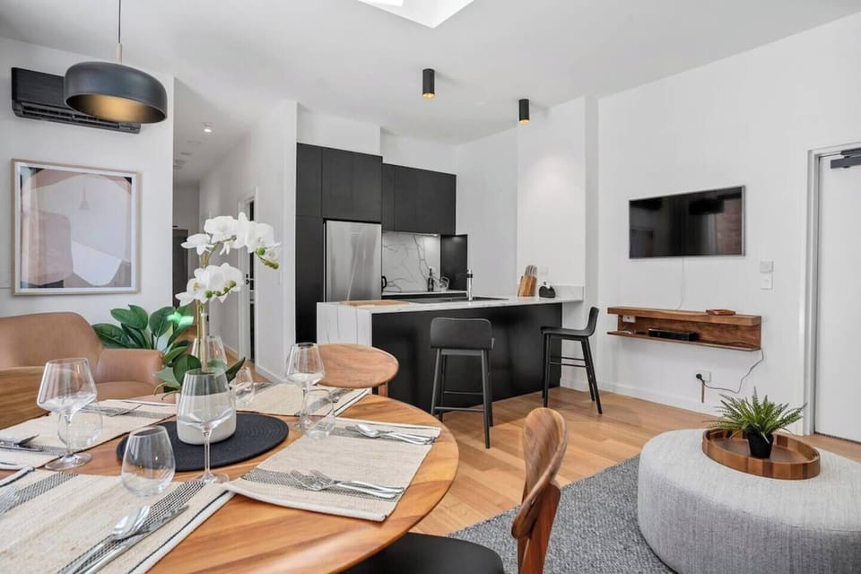 The open-plan design enhances the dining experience, connecting effortlessly to the living area.

