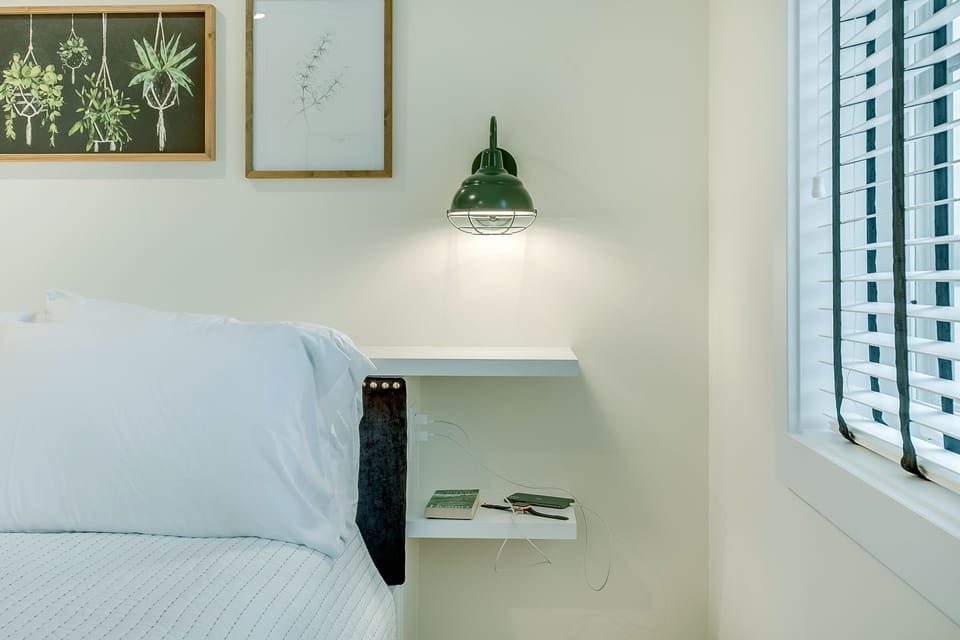 Bedside Dual Plug and Reading Light Switch in each bedroom
