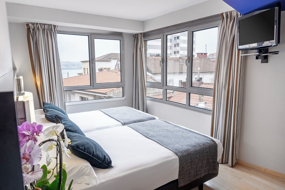 2 Single Beds | In-room safe, desk, laptop workspace, WiFi (free)