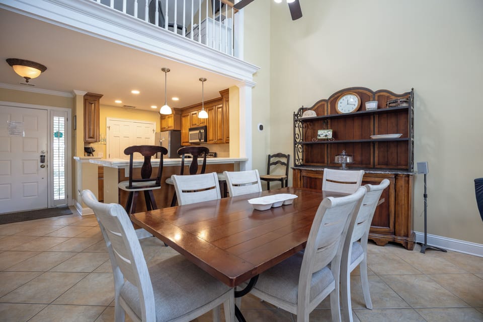 The dining space comfortably seats six and flows seamlessly into the living room,
