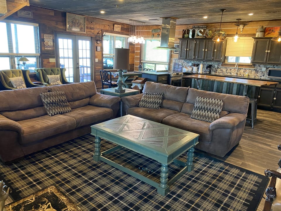 View from the living room looking into the kitchen and dining areas.
