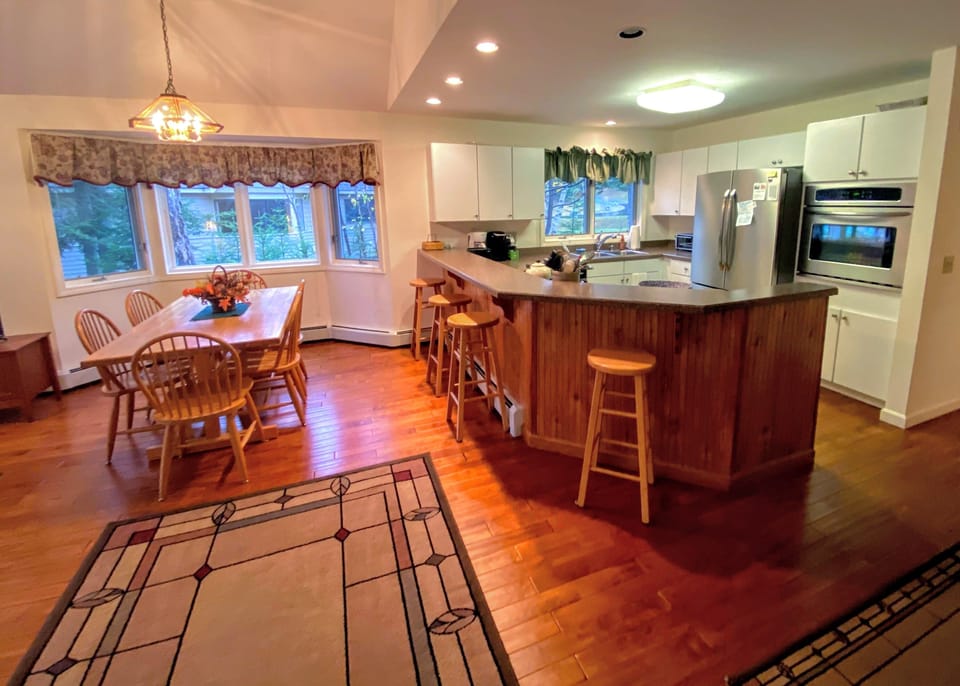 A cozy breakfast bar offers seating for 4.