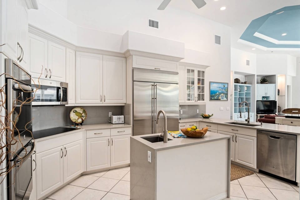 Dual sinks, dual wall ovens and ample counter space makes meal prep a breeze.