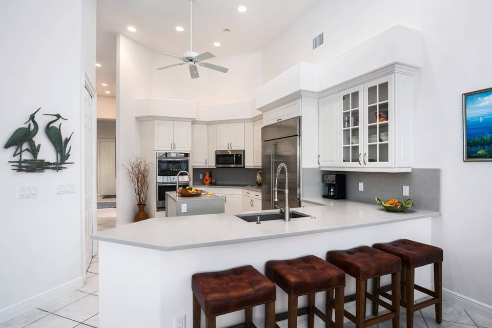 Keep the chef company at the breakfast bar.