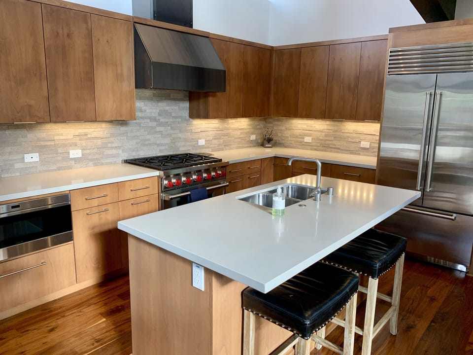 Fully equipped kitchen with Wolfe appliances and custom cabinetry.