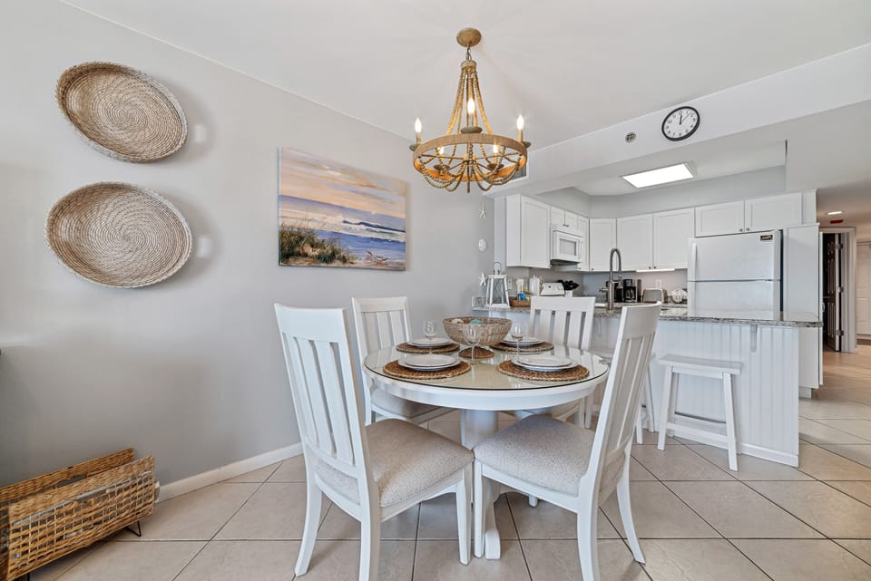 The natural textures and soft light create a serene atmosphere perfect for enjoying meals with a view.