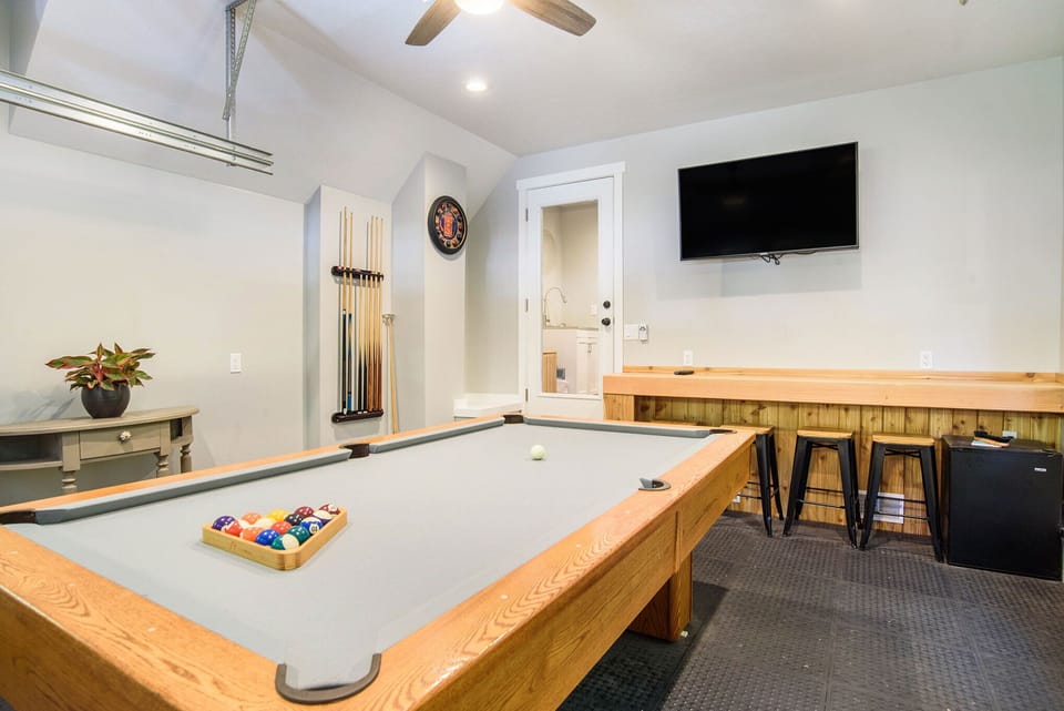 Picture yourself hanging here with friends - play pool and watch the big game
