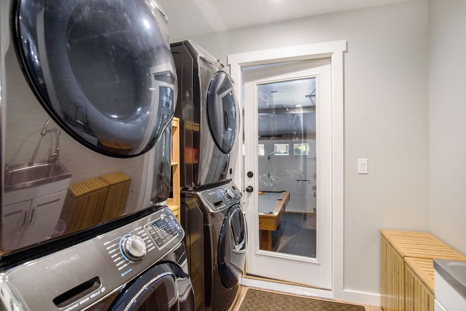 Laundry room with 2 washers and 2 dryers