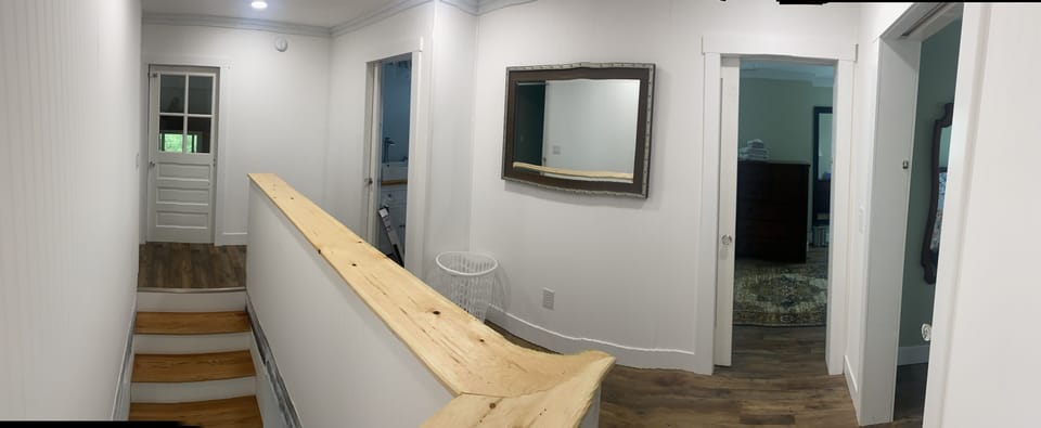 Second Floor Hallway. Bedroom 2 is to the left at the top of the stairs. 