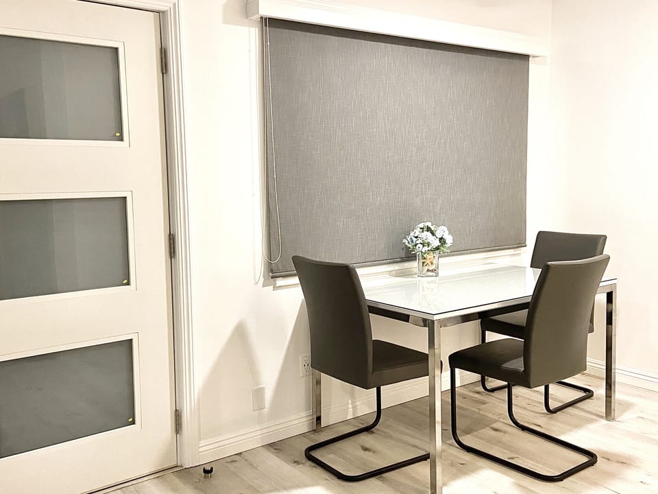 Kitchen table area with shades closed