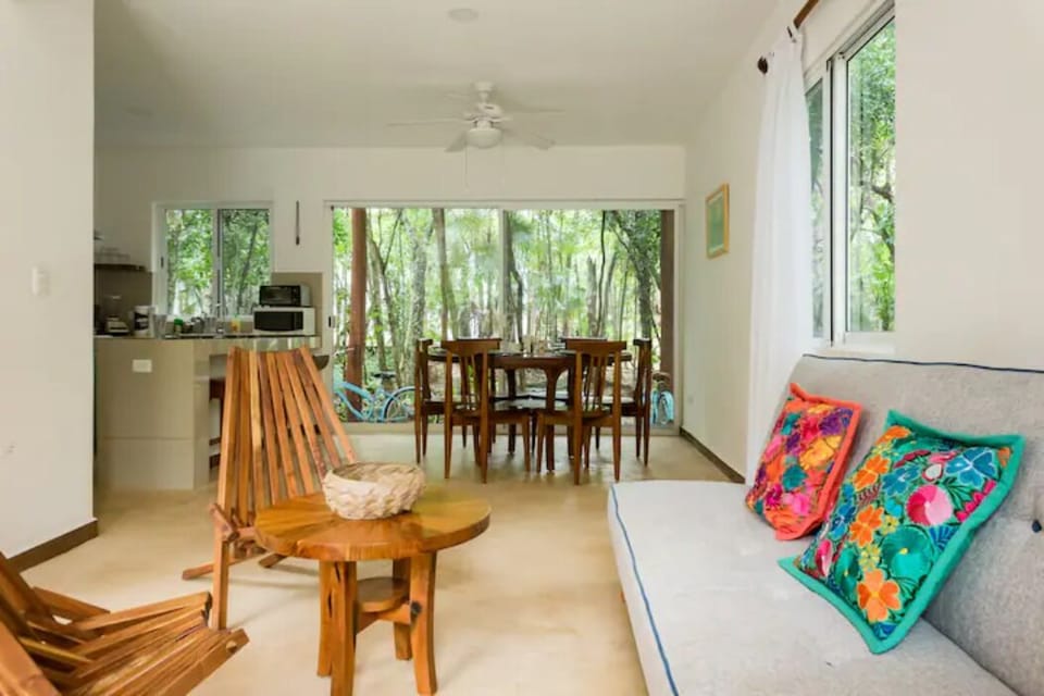 Casa Muuch Living room view with dining area.