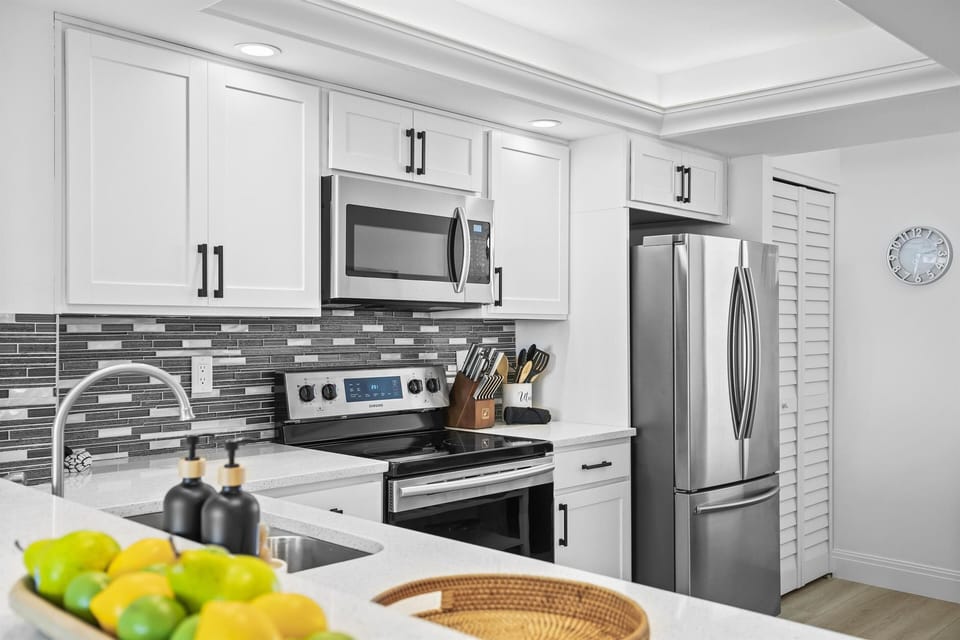 Well stocked and updated kitchen with new appliances and pantry