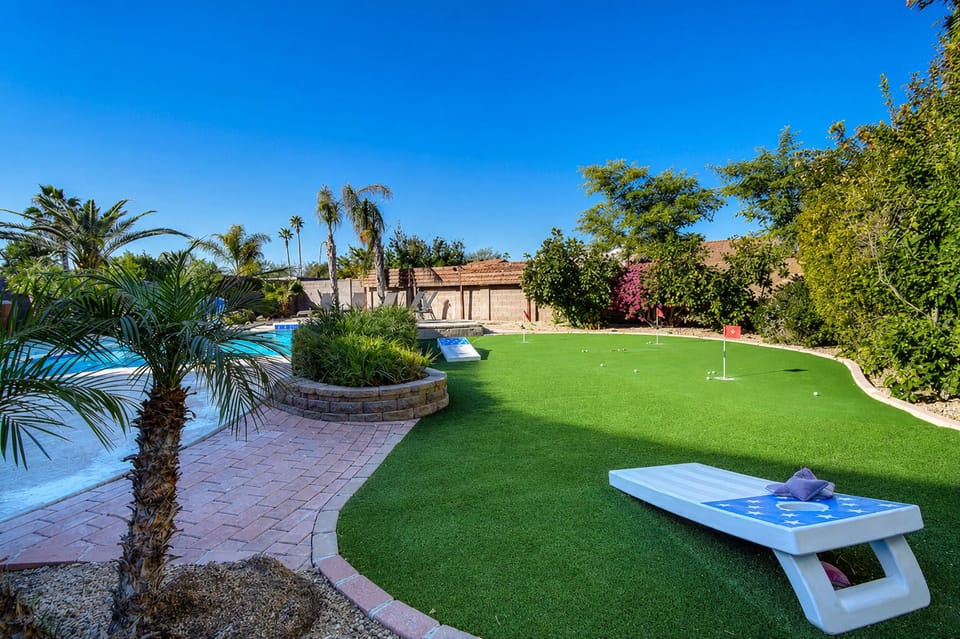 Three hole putting green and bean bag toss.