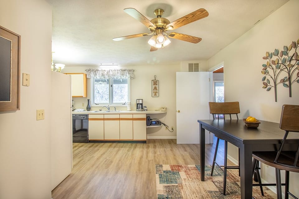 Full kitchen includes cookware and dinnerware