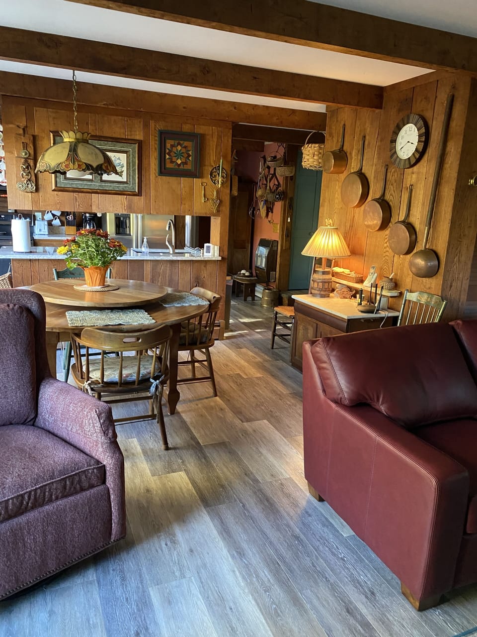 Comfortable living/dining areas with antique lazy susan table