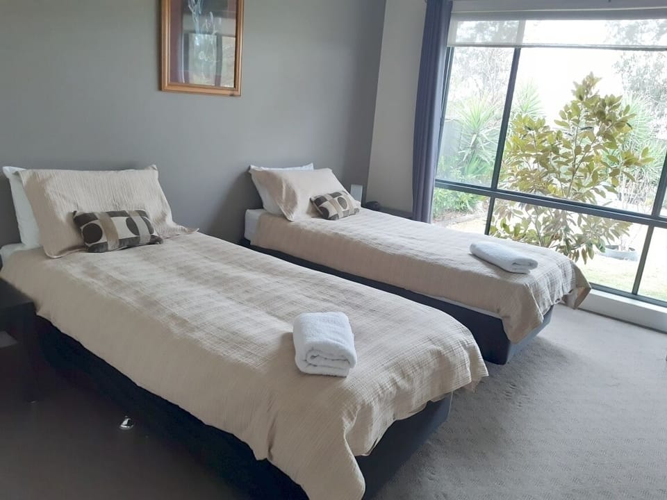 Bedroom 1 - King Bed or 2 x King singles