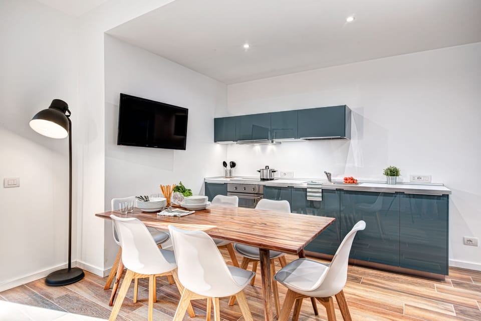 Apartment, 3 Bedrooms | Private kitchen | Full-size fridge, stovetop, coffee/tea maker, cookware/dishes/utensils