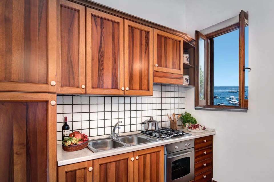 Apartment, 2 Bedrooms | Private kitchen | Full-size fridge, oven, stovetop, cookware/dishes/utensils