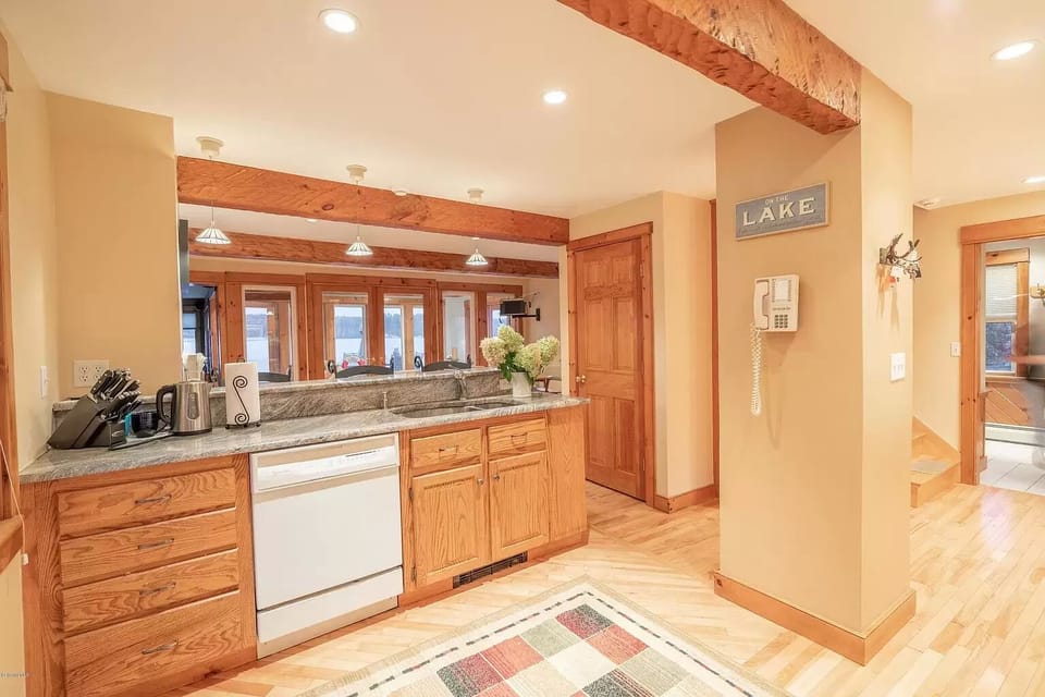 Kitchen looking at the dining area and lake