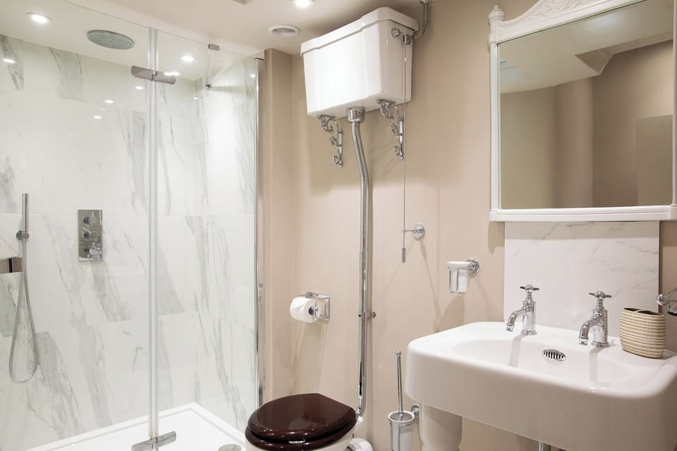 Bathroom sink, shower and toilet