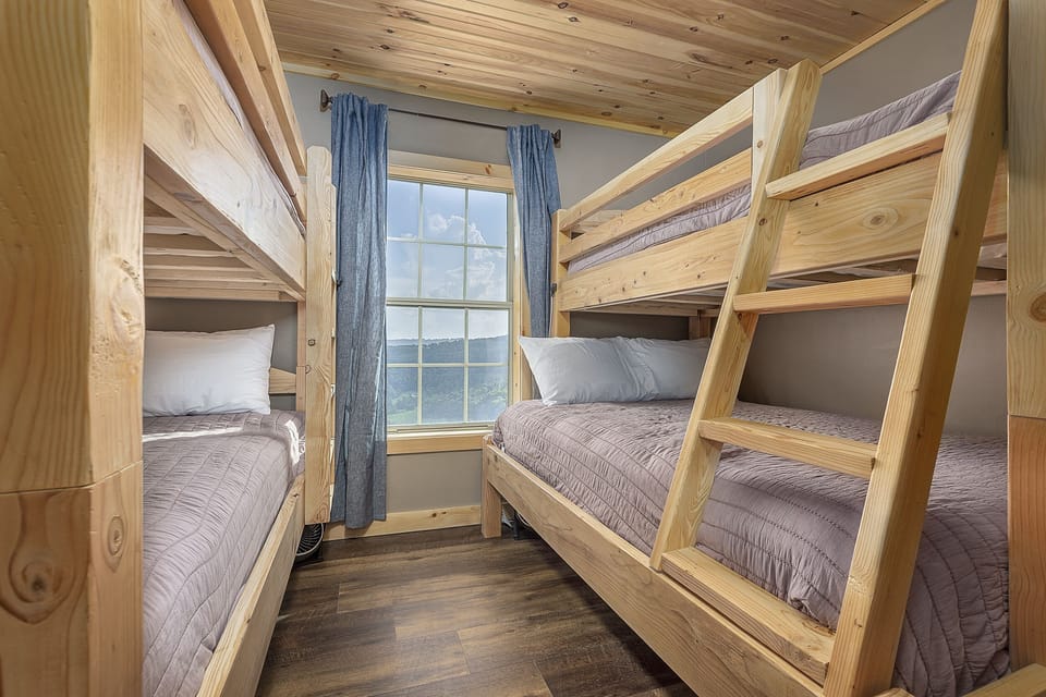 Bunk room with 3 twins and 1 full.