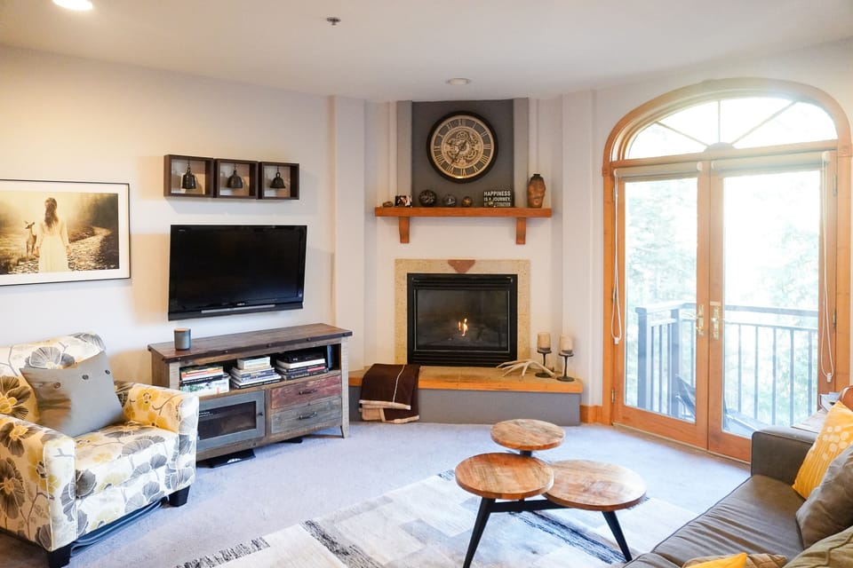 Living Room with Fire Place and large screen TV