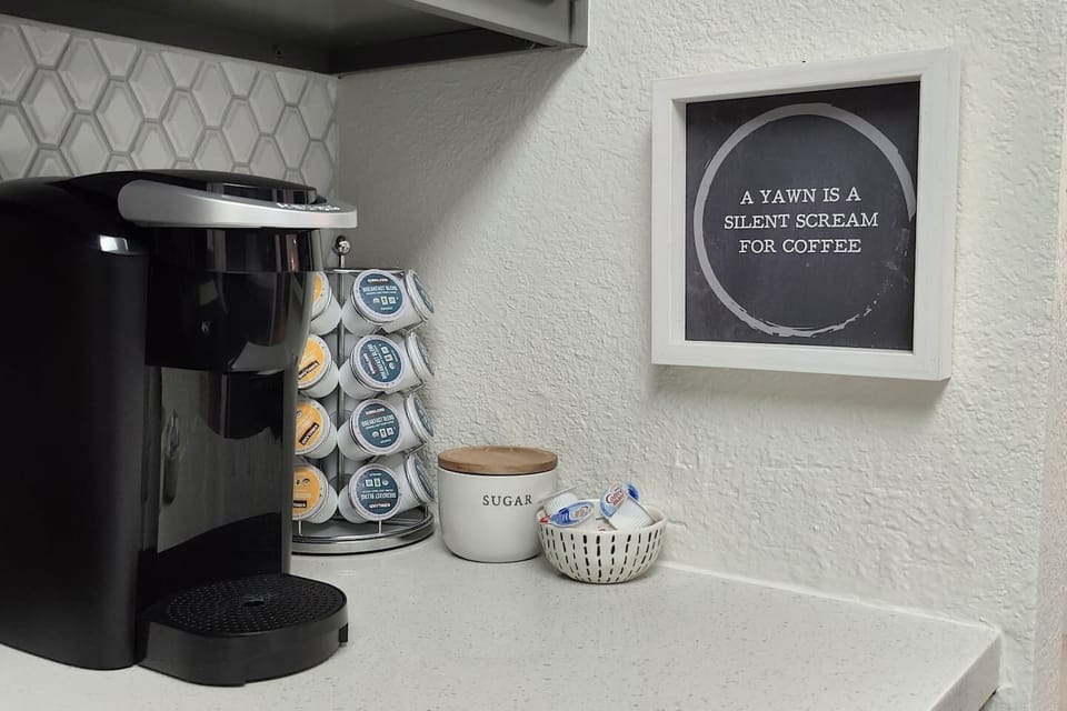 Coffee bar with a variety of drinks, sugars, and creamers to choose from to get your day started!