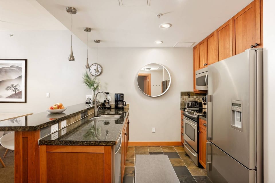 The beautiful kitchen is fully stocked so you can easily prepare delicious meals during your stay.