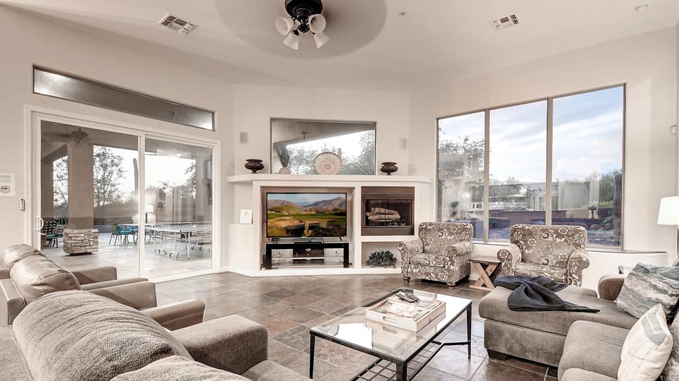 Studio (6 Bedrooms) | Living area | 50-inch TV with cable channels