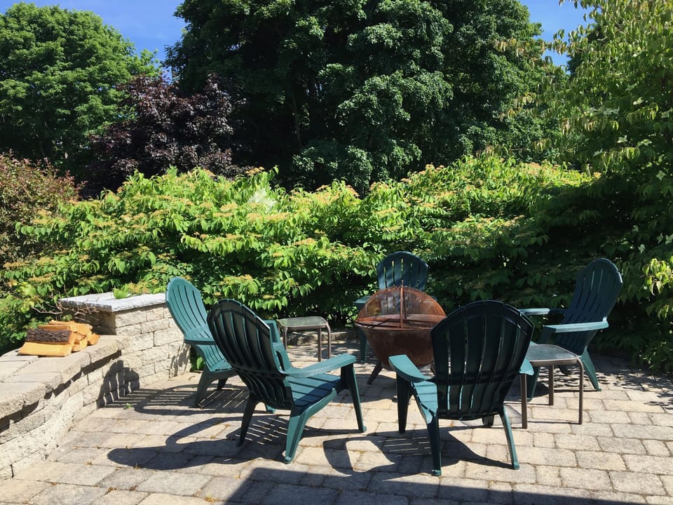Outside fire pit on terrace.
