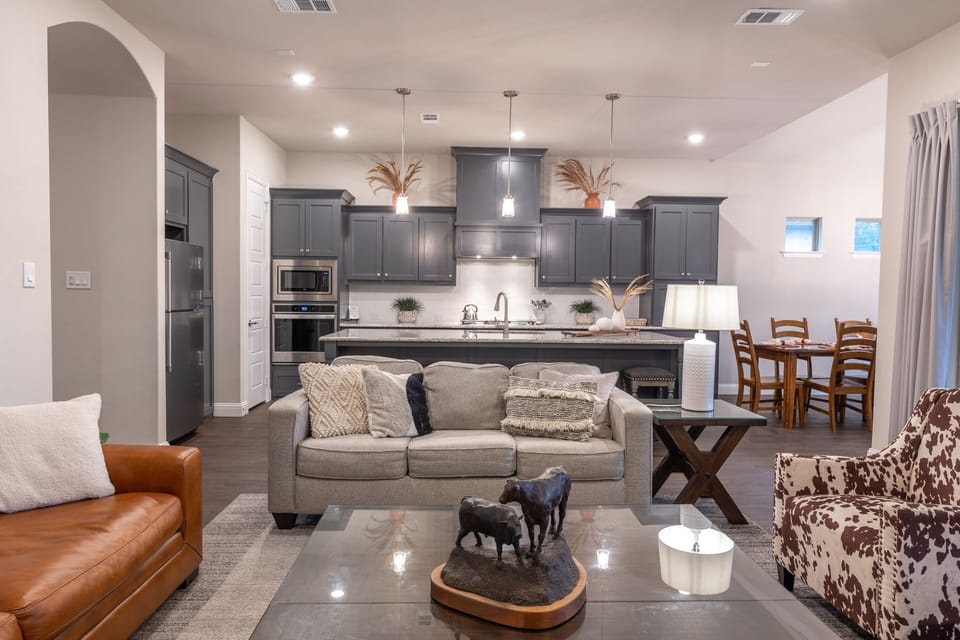 Plenty of gathering space near fully stocked kitchen