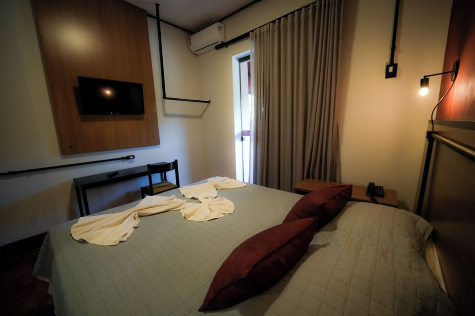SUITE COM SACADA | Free WiFi, bed sheets
