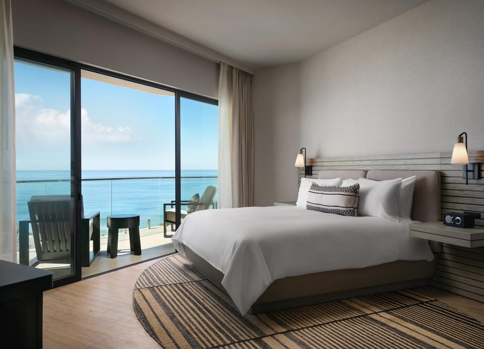 Premium bedding, down comforters, pillowtop beds, in-room safe
