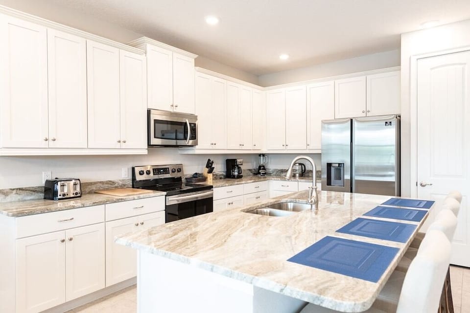 Cook up your favorite meals in this fully equipped kitchen, complete with everything you need to create delicious dishes.