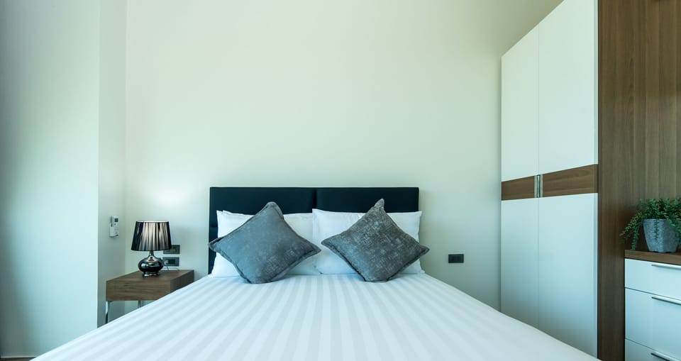Basic Apartment | 1 bedroom, in-room safe, blackout drapes, iron/ironing board