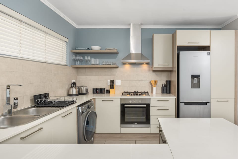 Luxury Apartment | Private kitchen | Full-size fridge, microwave, oven, stovetop