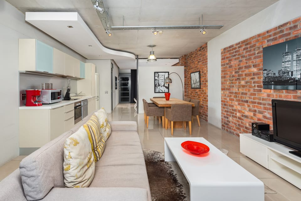 Grand Apartment | Living area | 50-inch flat-screen TV with cable channels, TV