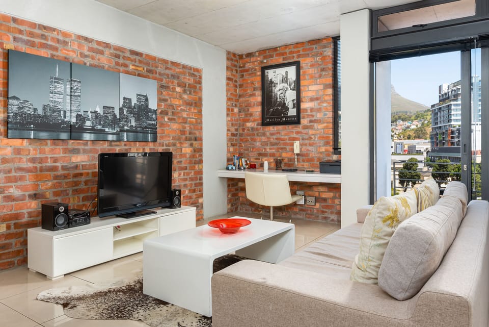 Grand Apartment | Living area | 50-inch flat-screen TV with cable channels, TV