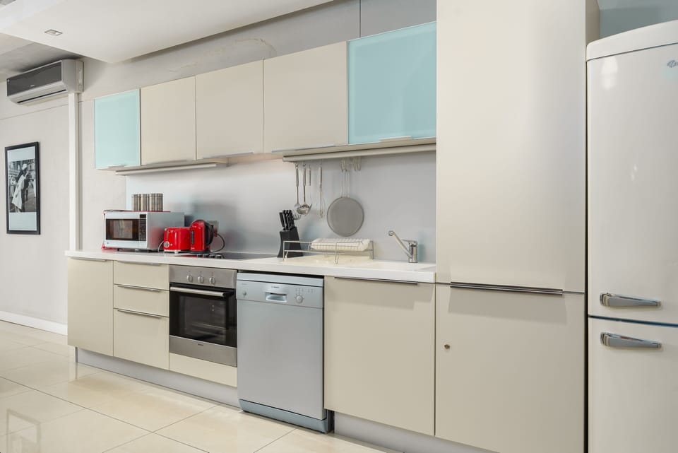 Grand Apartment | Private kitchen | Full-size fridge, microwave, oven, stovetop