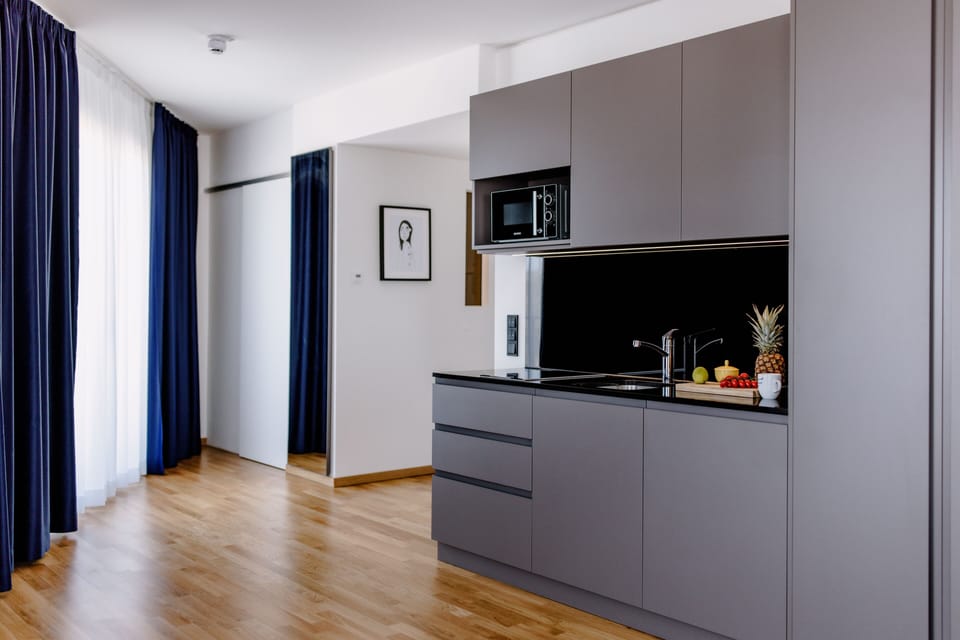 Mini-fridge, microwave, electric kettle, toaster