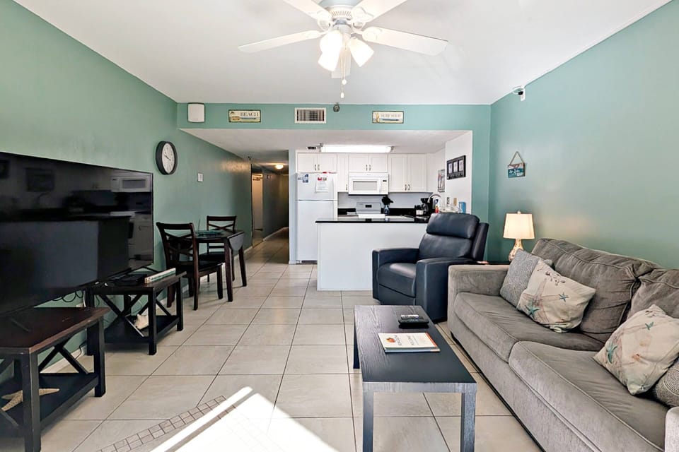 Living room features a NEW sleeper sofa (converts to Full size bed), NEW electric leather recliner, 2 end tables, a coffee table,...