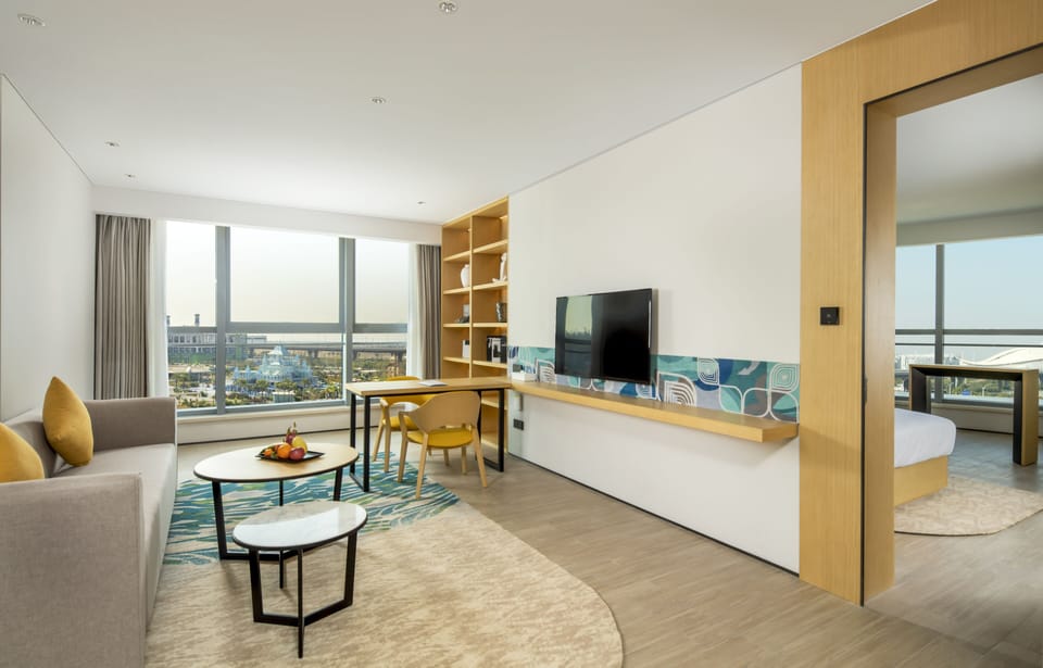 Deluxe Suite, 1 King Bed | In-room safe, desk, laptop workspace, soundproofing