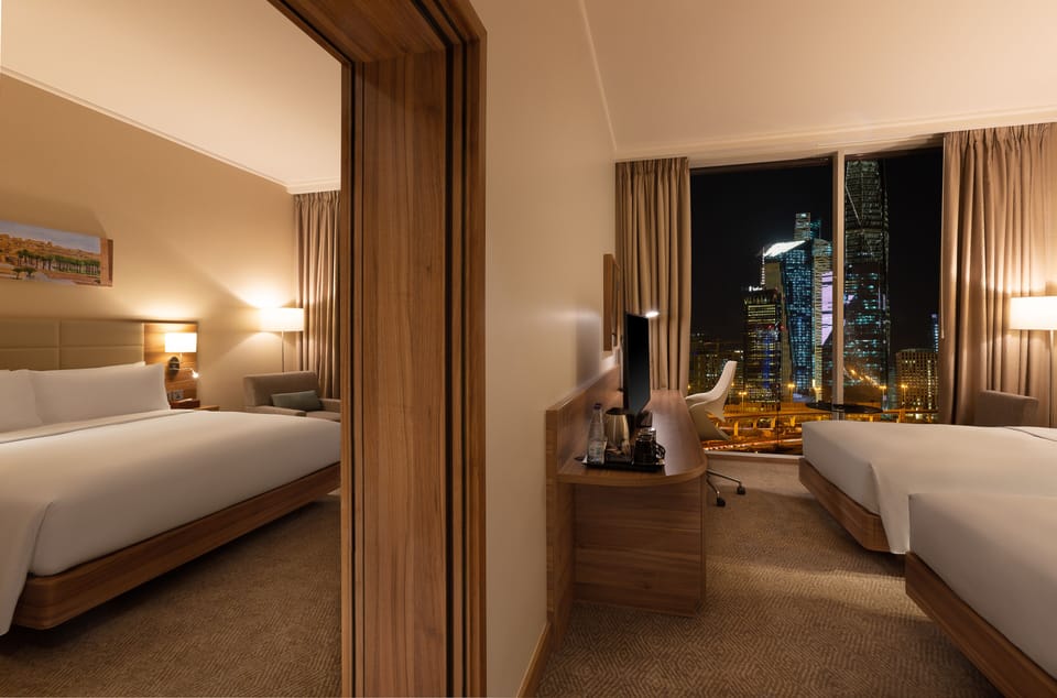 Family Room, 1 King Bed, Connecting Rooms | Hypo-allergenic bedding, in-room safe, laptop workspace, blackout drapes