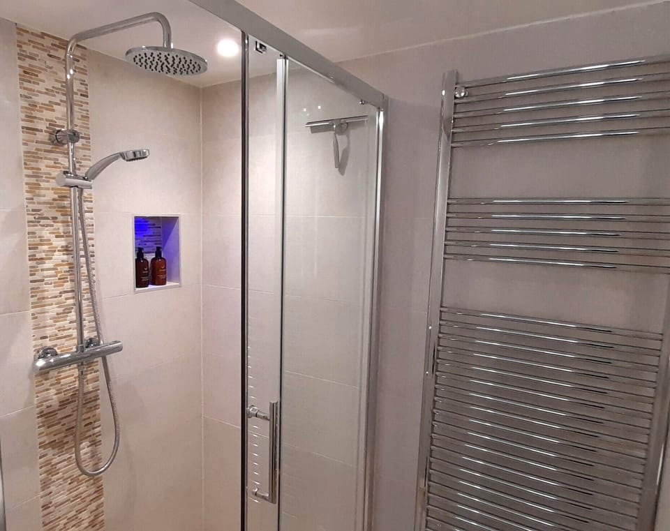 Modern rain shower & toiletries