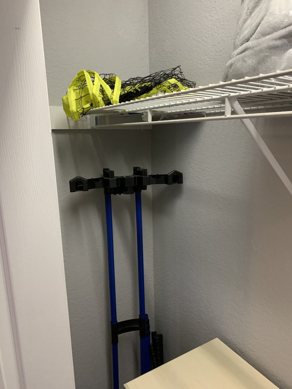 Closet in master bedroom, badminton set