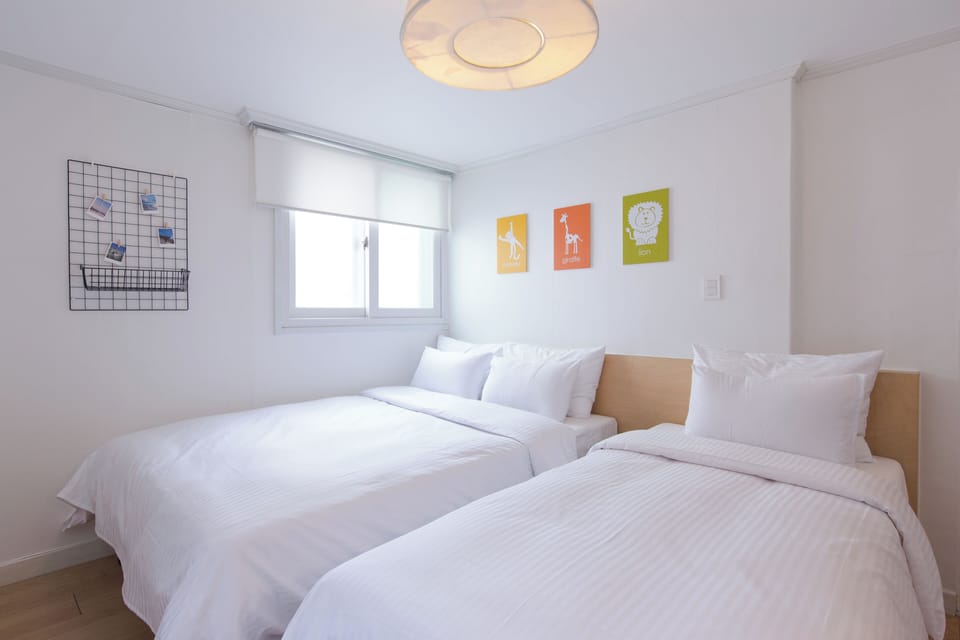25)Triple Room | Desk, laptop workspace, blackout drapes, iron/ironing board