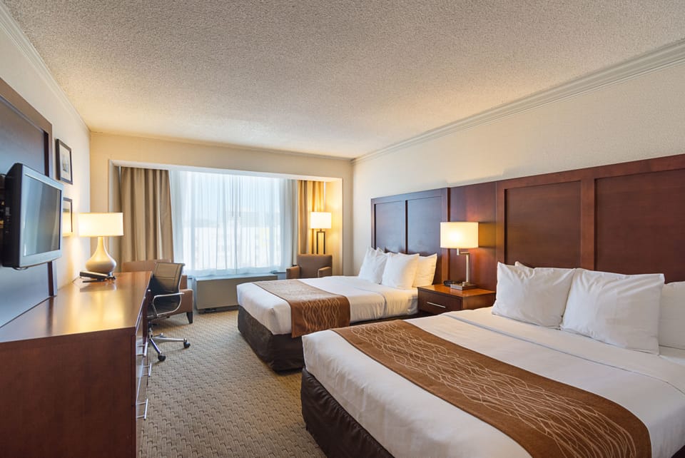 Premium bedding, down comforters, pillowtop beds, in-room safe